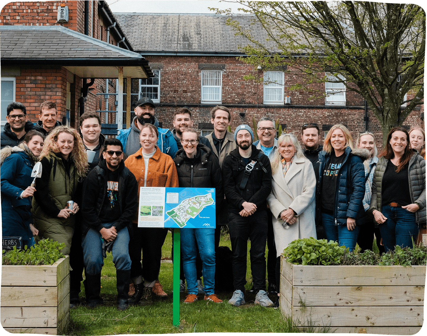 Greener communities group standing together