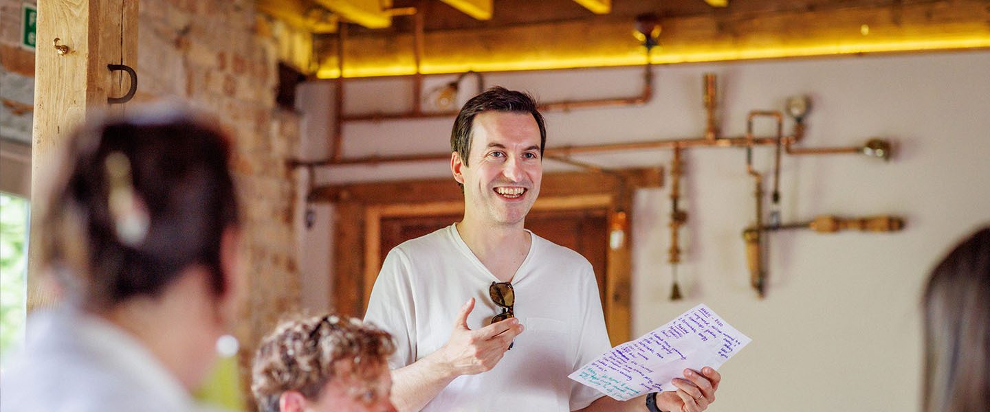 Hubbub's CEO Alex giving a speech to the Hubbub team.